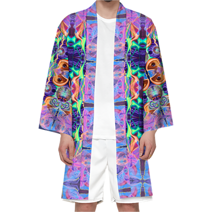 Person wearing a colorful, patterned robe on a white background