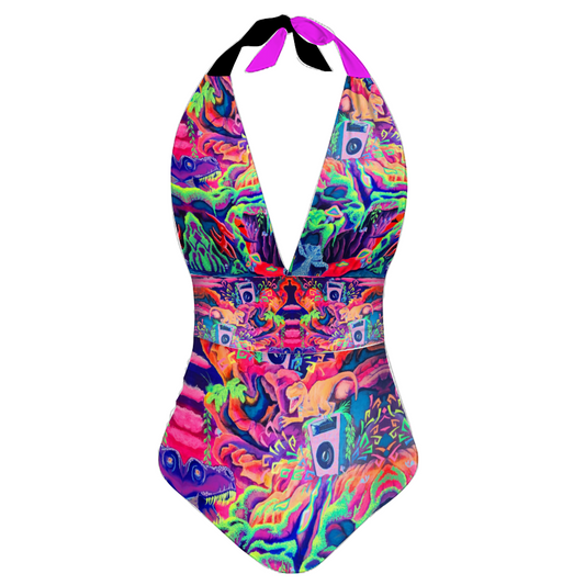 one piece swimsuit featuring dinosaurs in a prehistoric theme